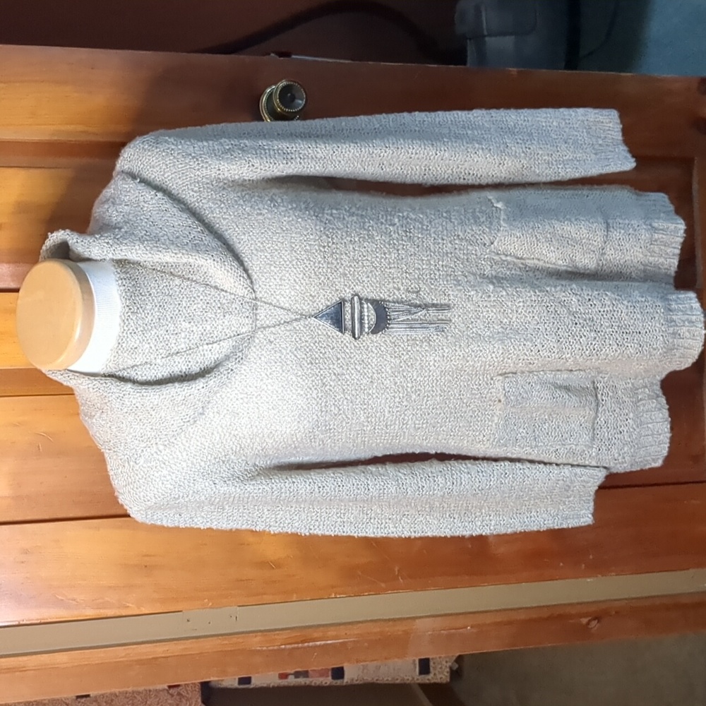 Long sleeve cowl neck style bouclé 2 front pocket cream coloured tunic sweater
